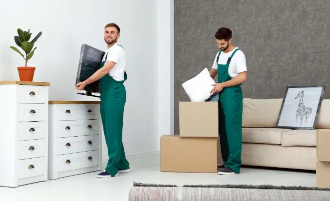 Movers carrying furniture